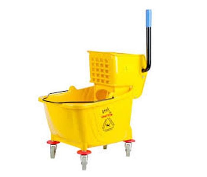 Yellow commercial mop bucket
